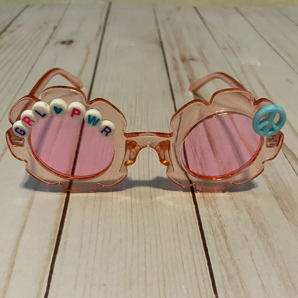 Girls pink see through flower shaped grl pwr sunglasses